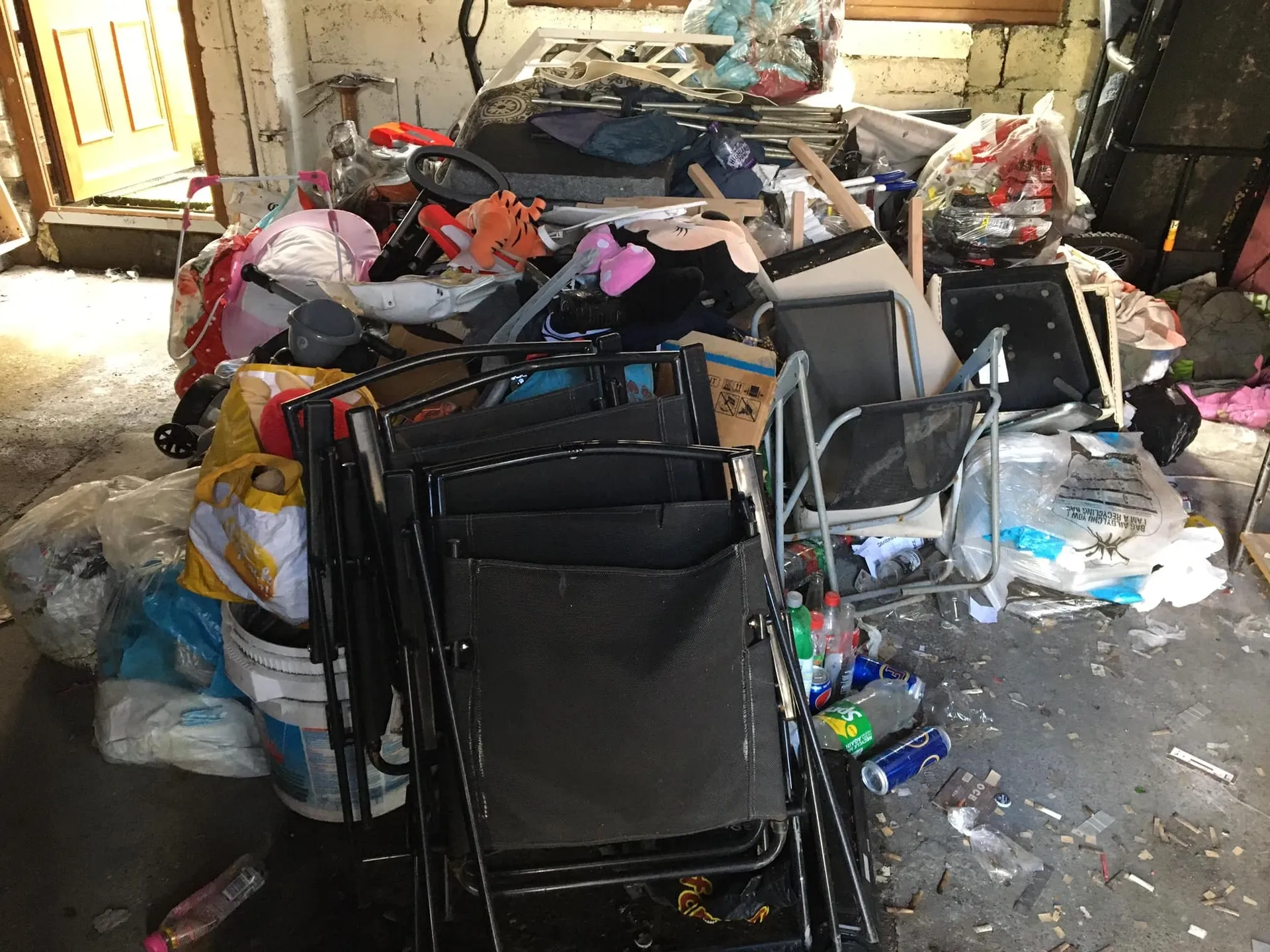 a photo of a garage full of junk in Neath, Port Talbot, and Swansea