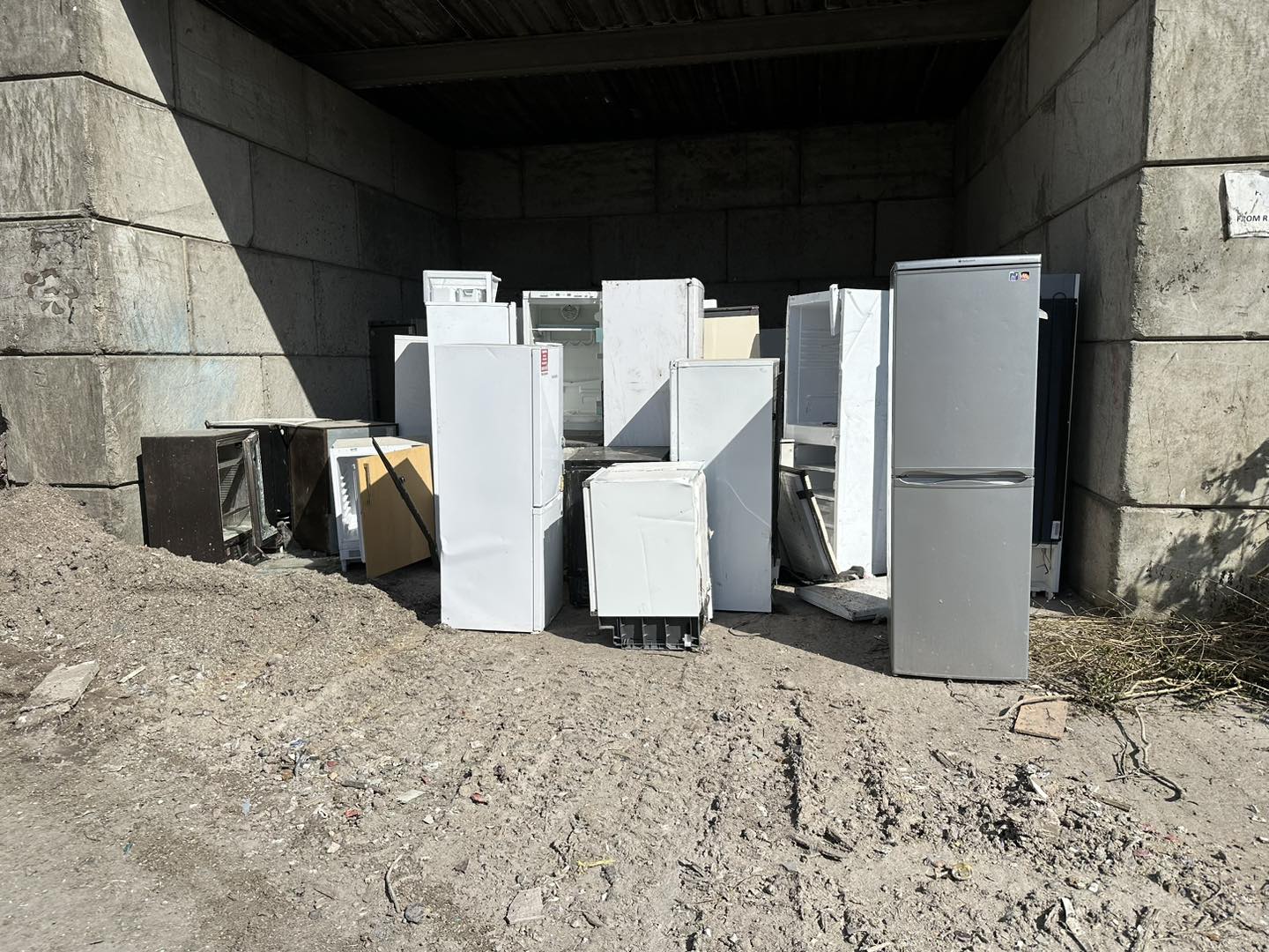 a photo of white goods and electrical appliances in a recycling bay in Neath, Port Talbot, and Swansea