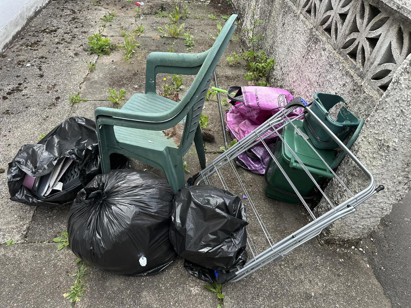 a photo of a chair and black bags in Neath, Port Talbot, And Swansea