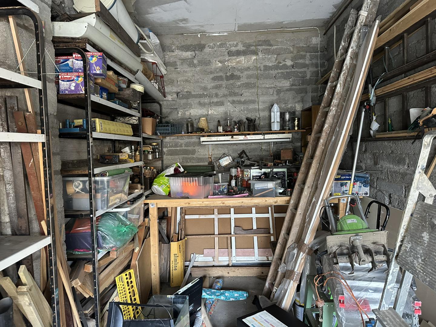 A close up photo of a garage full of junk