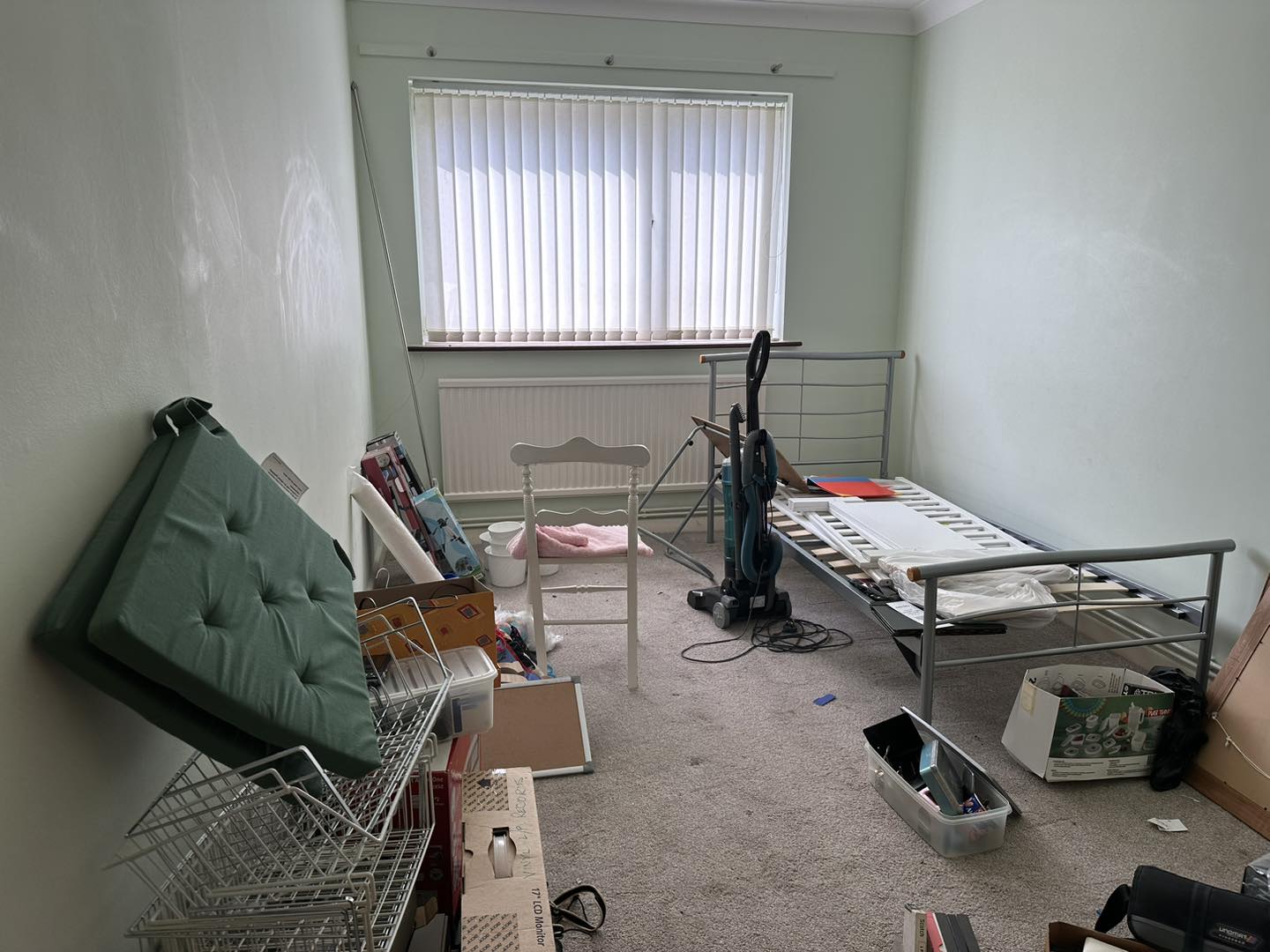 A photo of a house bedroom that is full of waste