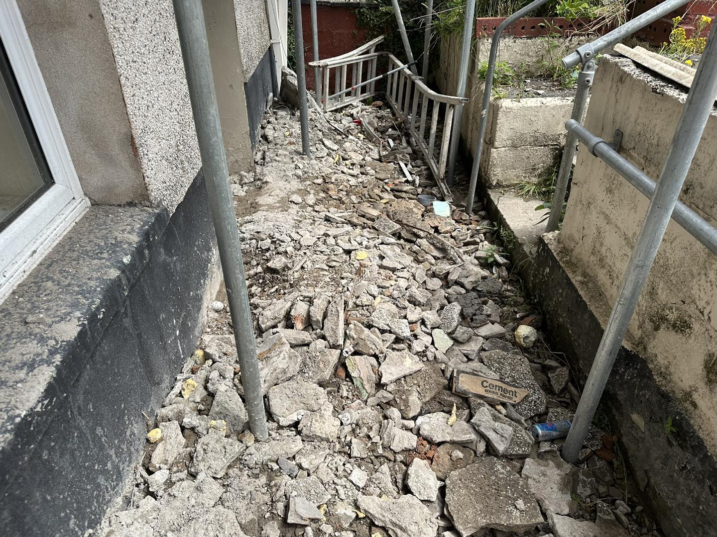 A photo of debris on the floor outside