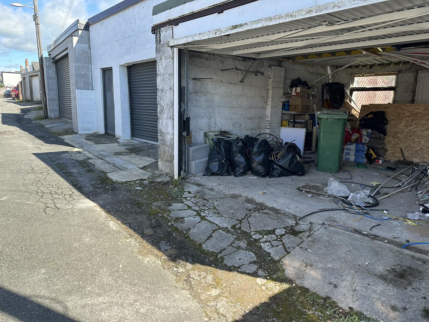 Photo of a clear way footpath leading into garage
