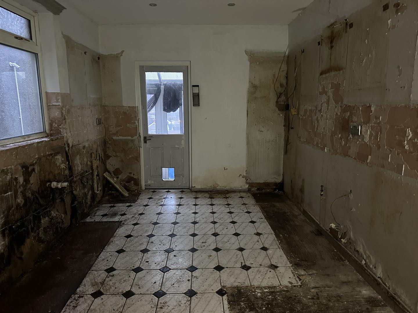 Photo of a kitchen that has been stripped out