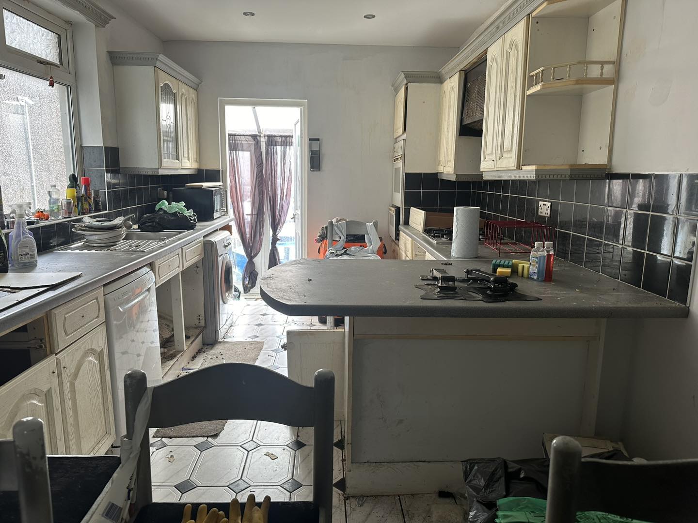 A photo of an old kitchen to be removed