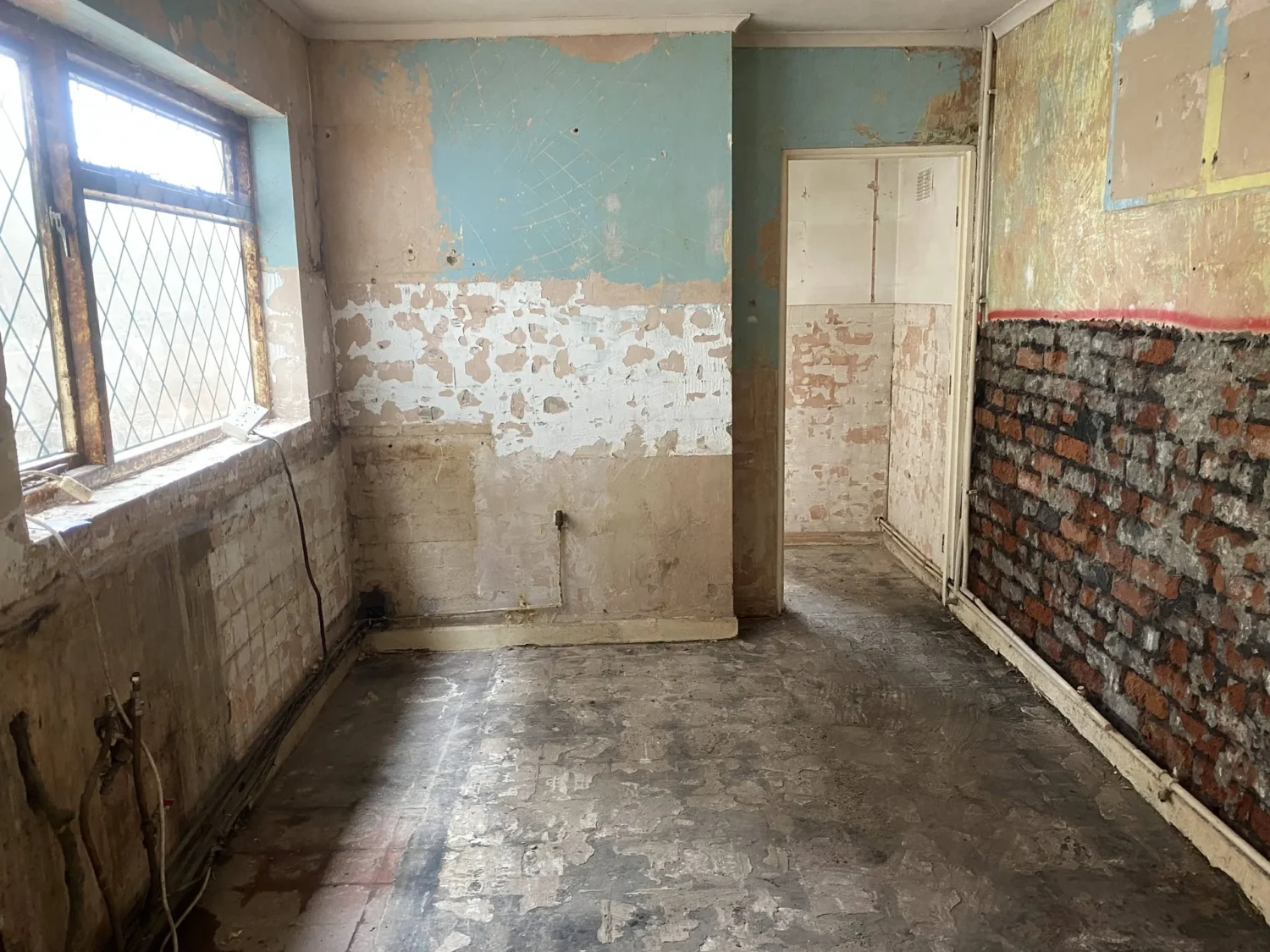 A photo of a kitchen that has been removed and stripped out